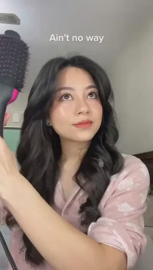 Pakistani woman using one step hot air brush for salon blowout at home – BeautiVox Pakistan