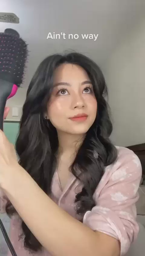 Pakistani woman using one step hot air brush for salon blowout at home – BeautiVox Pakistan